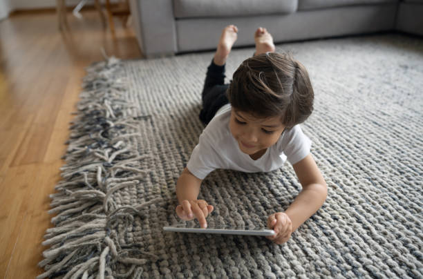 Girl laying on rug | Chillicothe Carpet